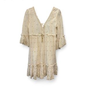 100% Cotton Boho Cream Mini Dress with bell sleeves. Gold, mirror, fringe